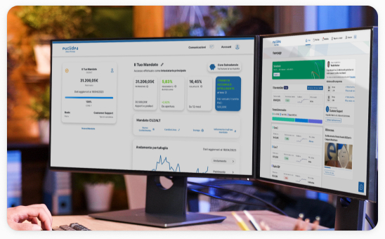 Wealth advisor Euclidea che utilizza due monitor per visualizzare lo stato degli investimenti